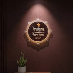 Deshmukh Chaitanya Minal 502 round devotional LED nameplate — Supplied installed scene, warm LED on