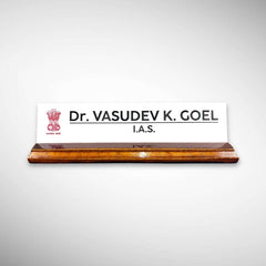 A premium desk nameplate featuring a polished wooden base with a sleek acrylic | Dr. Vasudev Goel