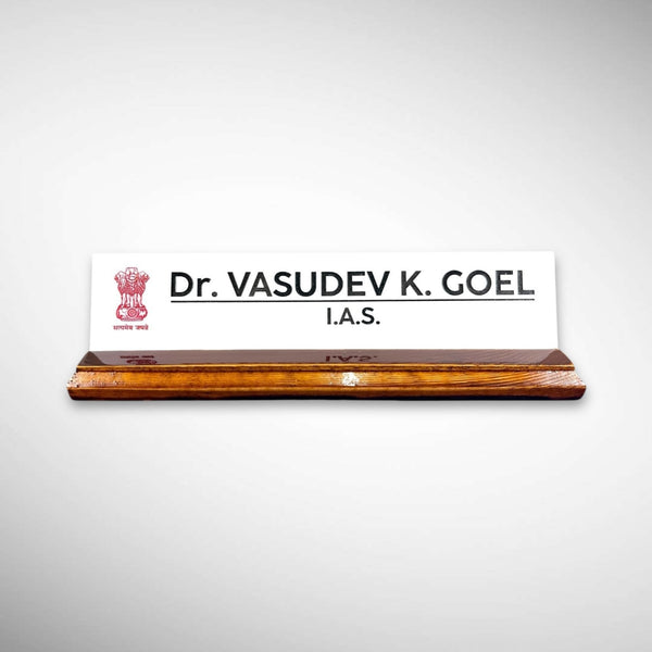 A premium desk nameplate featuring a polished wooden base with a sleek acrylic | Dr. Vasudev Goel