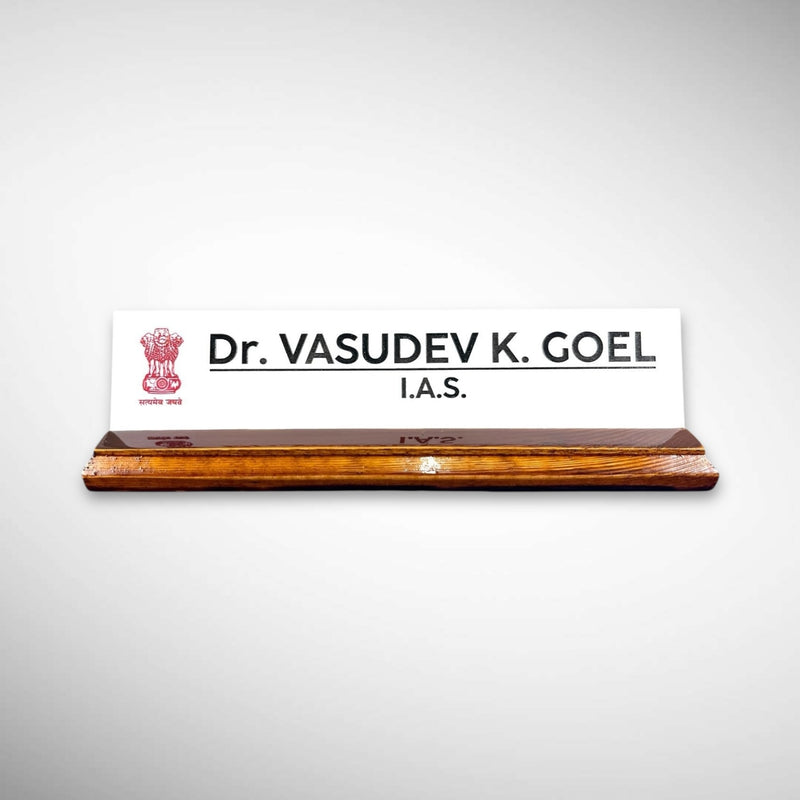 A premium desk nameplate featuring a polished wooden base with a sleek acrylic | Dr. Vasudev Goel