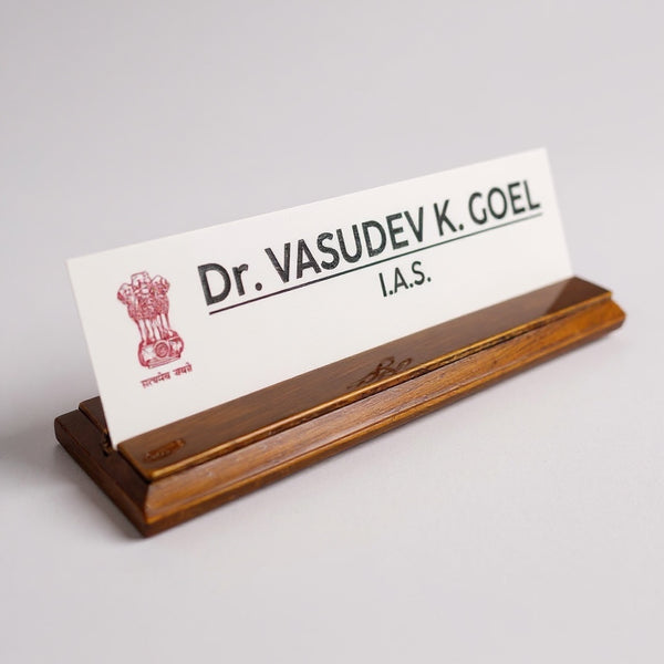 A premium desk nameplate featuring a polished wooden base with a sleek acrylic | Dr. Vasudev Goel