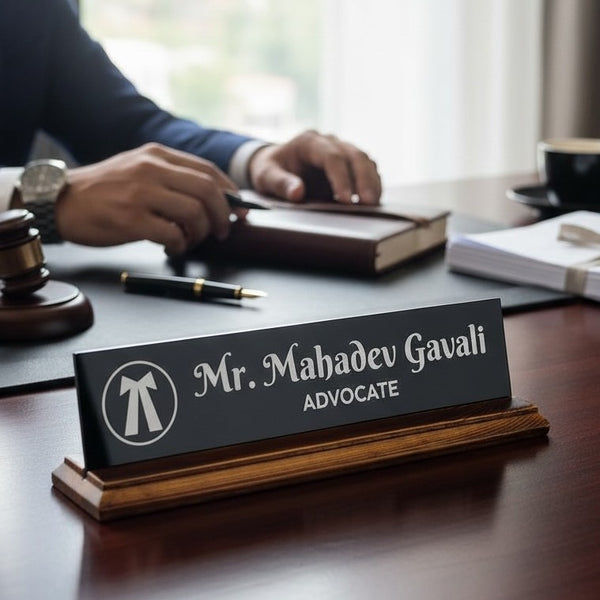 A premium desk nameplate featuring a polished wooden base with a sleek acrylic | Adv. Mahadev Gavali
