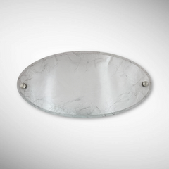 An elegant oval nameplate featuring a marble-style finish with raised black lettering | Koppikar