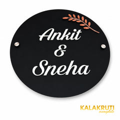 KKAA0009 Ankit & Sneha black acrylic nameplate — elevated angle