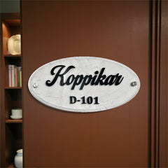 KKHC0005 handcrafted nameplate — installed