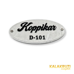 KKHC0005 handcrafted nameplate — additional angle with soft studio shadow