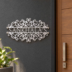 Sankhala's nameplate shown installed at a residential entrance