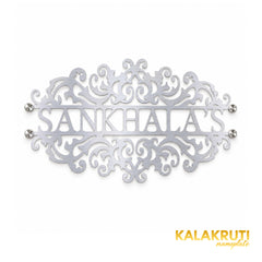 Sankhala's nameplate, straight-on front view on a white studio background