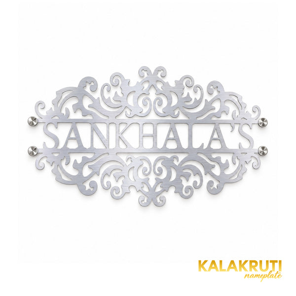 Sankhala's nameplate, straight-on front view on a white studio background