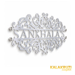 Sankhala's left angle of the nameplate on a white studio background