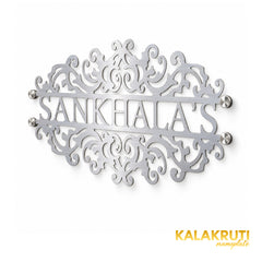 Sankhala's right angle of the nameplate on a white studio background