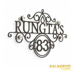 Rungta's left angle of the nameplate on a white studio background