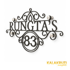 Rungta's right angle of the nameplate on a white studio background