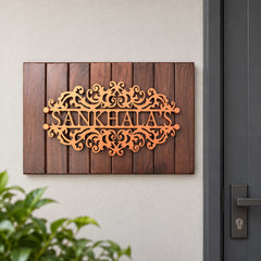 Sankhala's nameplate shown installed at a residential entrance