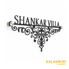 Shankar Villa left angle of the nameplate on a white studio background