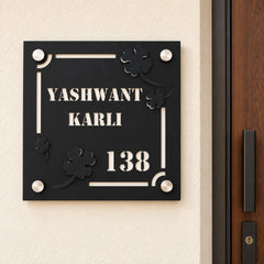 Yashwant Karli nameplate shown installed at a residential entrance