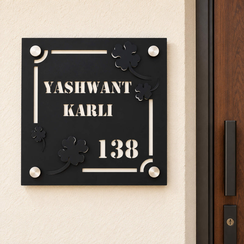 Yashwant Karli nameplate shown installed at a residential entrance
