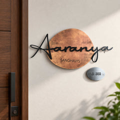 Aaranya nameplate shown installed at a residential entrance