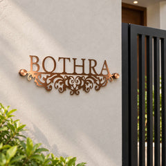 Bothra nameplate shown installed at a residential entrance