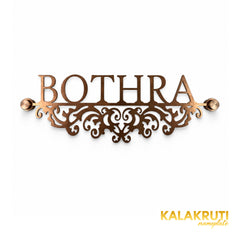 Bothra nameplate, straight-on front view on a white studio background