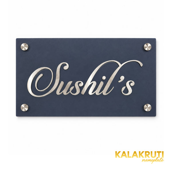 Sushil's nameplate, straight-on front view on a white studio background