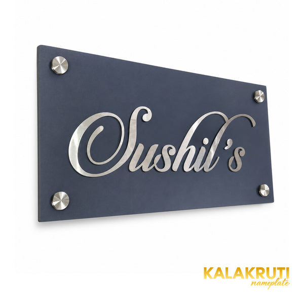 Sushil's left angle of the nameplate on a white studio background