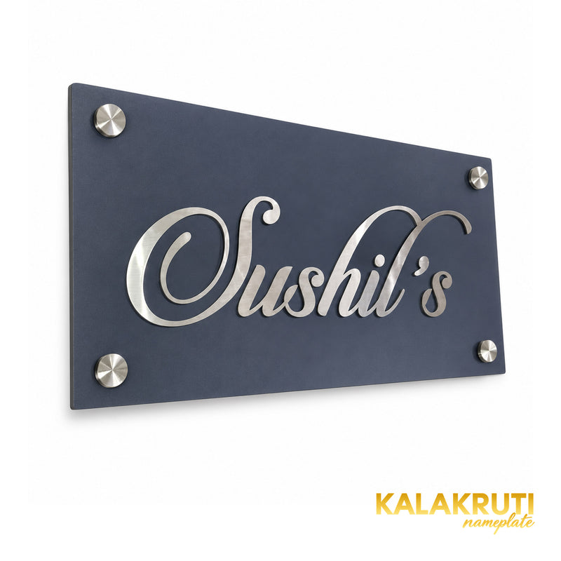 Sushil's left angle of the nameplate on a white studio background