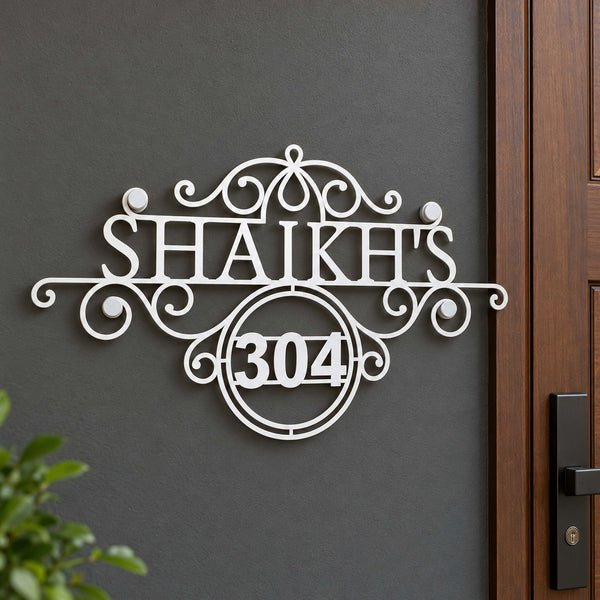 Shaikh's nameplate shown installed at a residential entrance