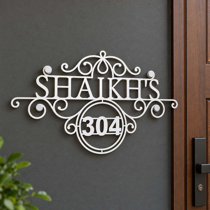 Shaikh's nameplate shown installed at a residential entrance