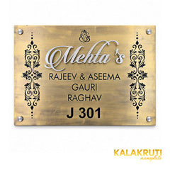 Mehta's nameplate, straight-on front view on a white studio background