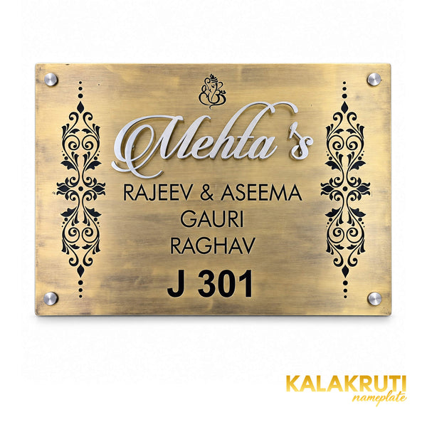 Mehta's nameplate, straight-on front view on a white studio background