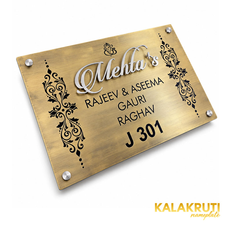 Mehta's nameplate, original diagonal view showing the floral side panels, silver-tone script and J 301