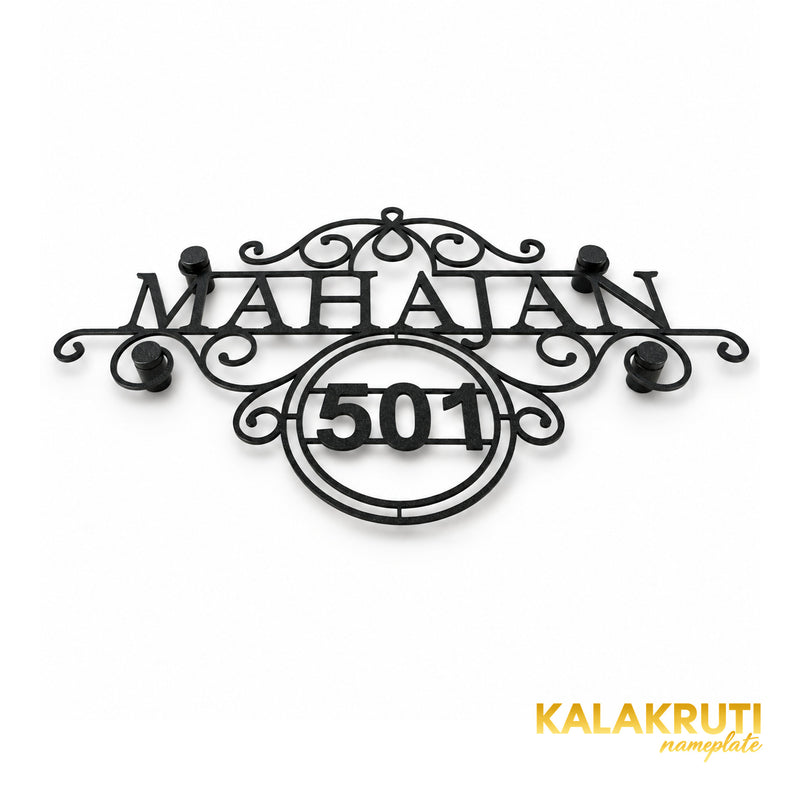 Mahajan nameplate, original low oblique view showing the textured black scrollwork and 501 frame