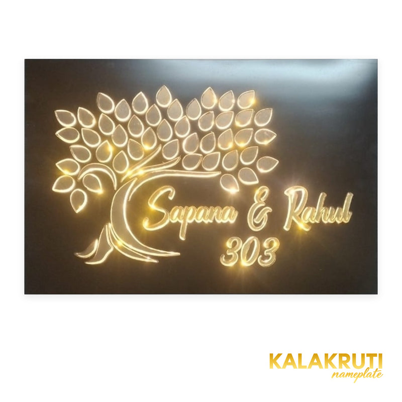 Sapana & Rahul 303 tree design LED nameplate — front view with warm LED illumination