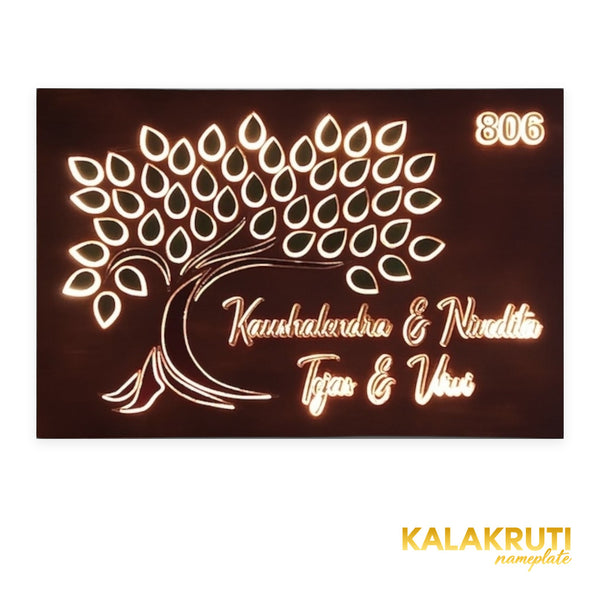 Kaushalendra & Nivedita 806 tree design wooden LED nameplate - front view with warm LED illumination