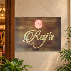 Raj’s wooden LED nameplate with gold script and orange Ganesh - installed LED on