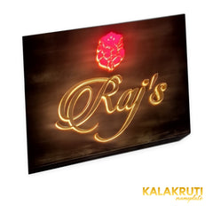 Raj’s wooden LED nameplate with gold script and orange Ganesh - left angle LED on