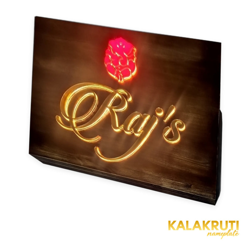 Raj’s wooden LED nameplate with gold script and orange Ganesh - right angle LED on