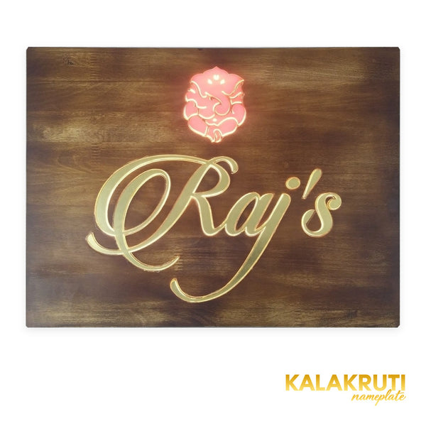 Raj’s wooden LED nameplate with gold script and orange Ganesh - front LED on