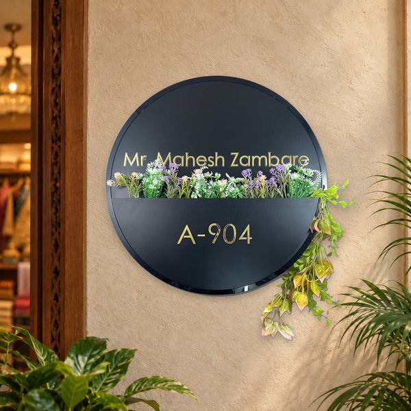 Mr. Mahesh Zambare A-904 round black floral planter nameplate - installed