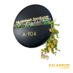 Mr. Mahesh Zambare A-904 round black floral planter nameplate - left angle