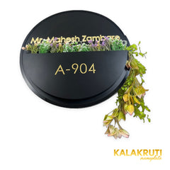 Mr. Mahesh Zambare A-904 round black floral planter nameplate - elevated angle