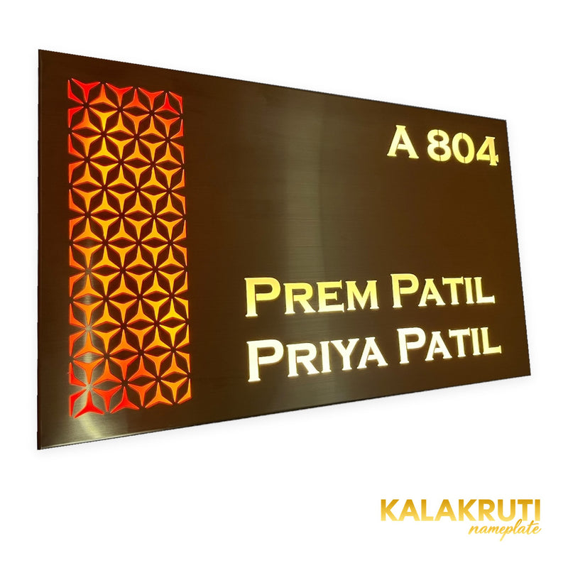 Prem Patil & Priya Patil A 804 copper-brown LED nameplate — Left angle warm LED on