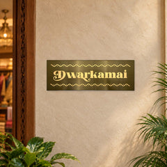 Dwarkamai brushed brass-gold LED nameplate — Installed warm LED on