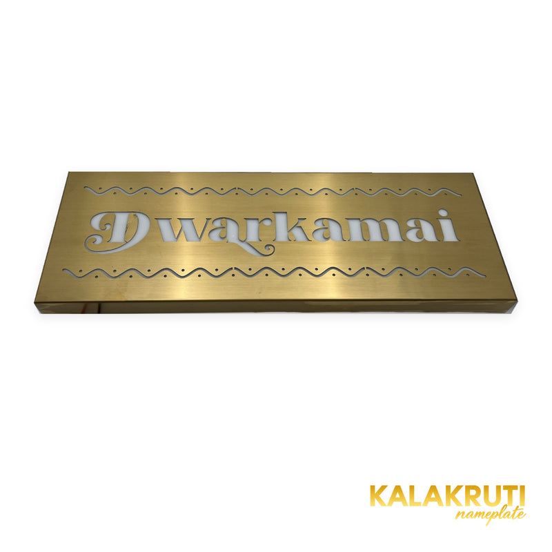 Dwarkamai brushed brass-gold LED nameplate — Low angle LED off with original folded return