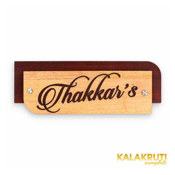 Thakkar’s wooden nameplate, front