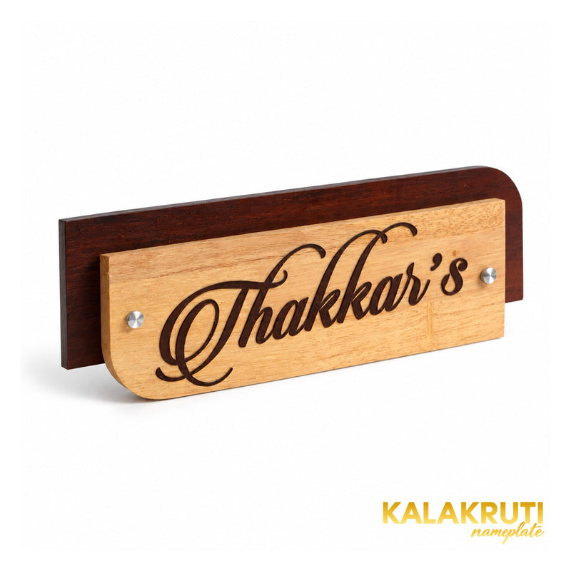 Thakkar’s wooden nameplate, left angle