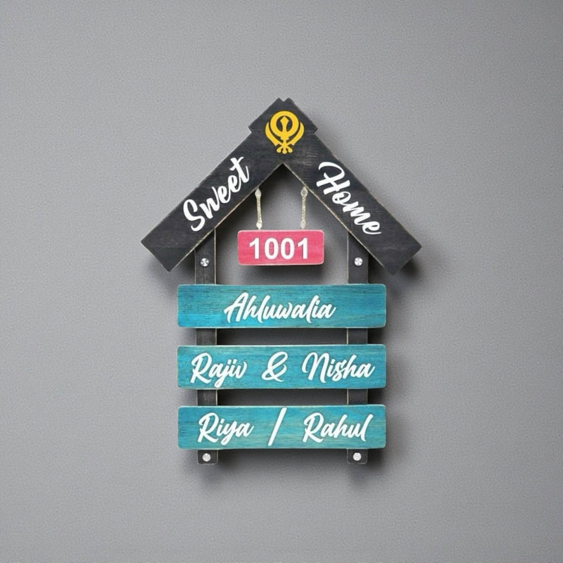 Black and Teal House Shape Wooden Nameplate | Ahluwalia — installed wall (KKWN0023)