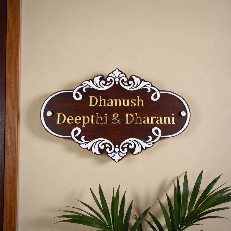 White Scroll Wooden Nameplate | Dhanush, Deepthi & Dharani — installed hero (KKWN0031_A)