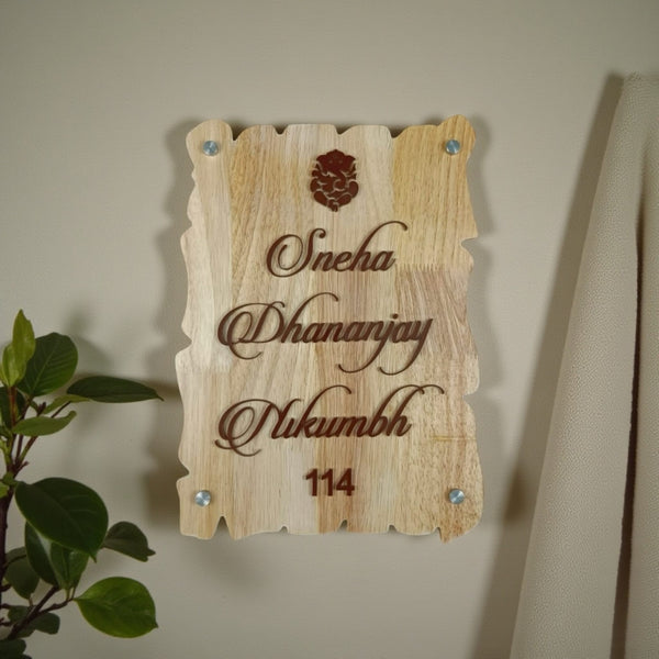 Natural Wood Ganesha Nameplate | Sneha & Dhananjay Nikumbh — installed hero (KKWN0038)